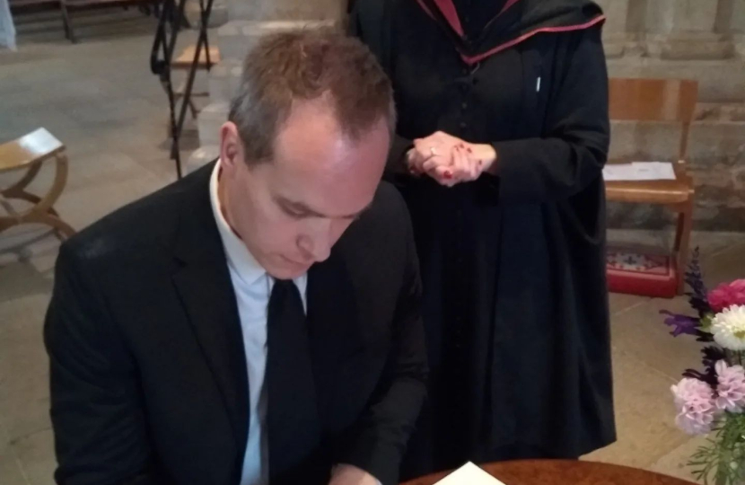 David signs Book of Condolence for the Royal Family