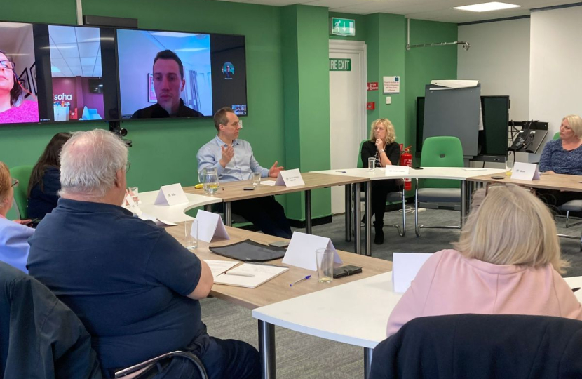 David answers questions at a SOHA tenants roundtable