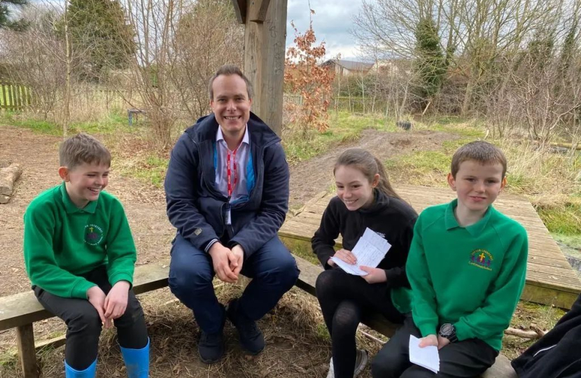 David answers questions at three local schools