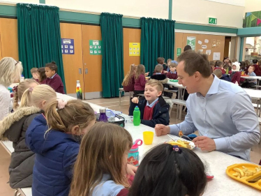 David answers questions at three local schools