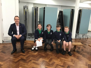 David visits local schools and businesses in the constituency